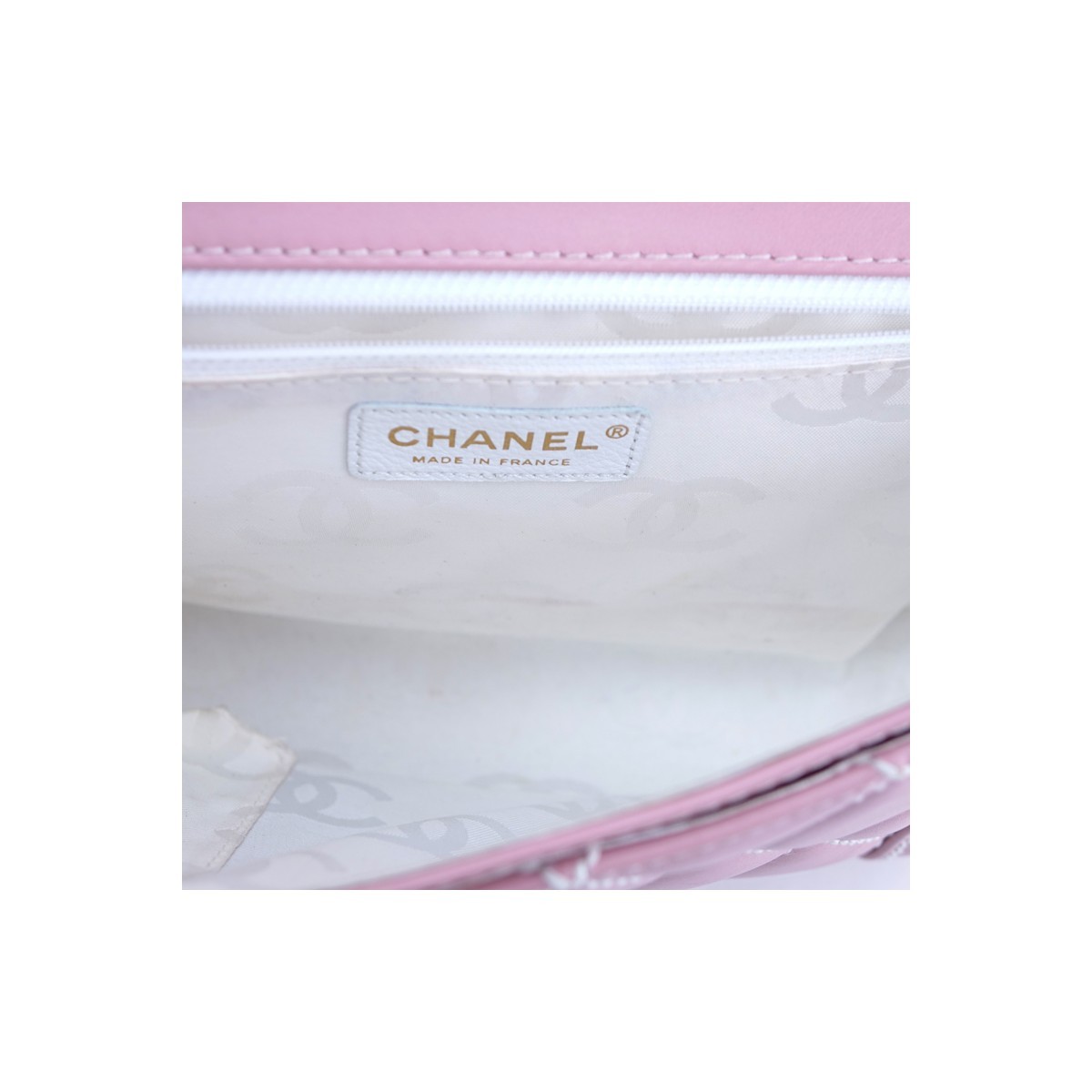 Chanel Light Pink Thick Quilted Leather Top Handle Rectangular Bag. Gold tone hardware, the interior of white monogram fabric with zippered and patch pockets.
