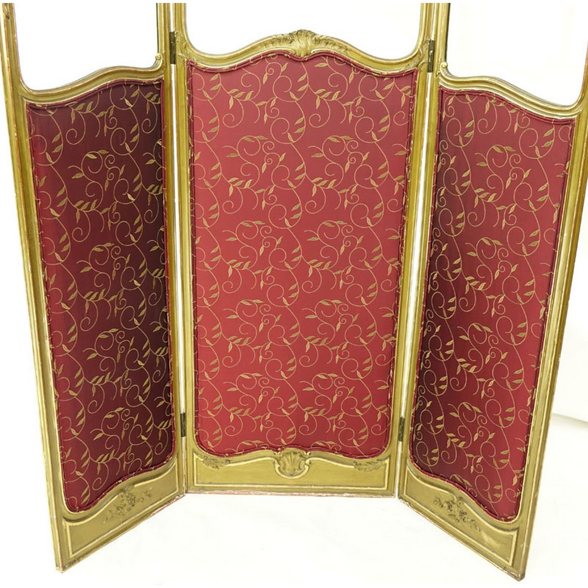 20th Century Louis XVI Style French Giltwood Carved and Silk Upholstered Three Panel Screen. Scratches to wood and rubbing to gilt, small loss to finial.