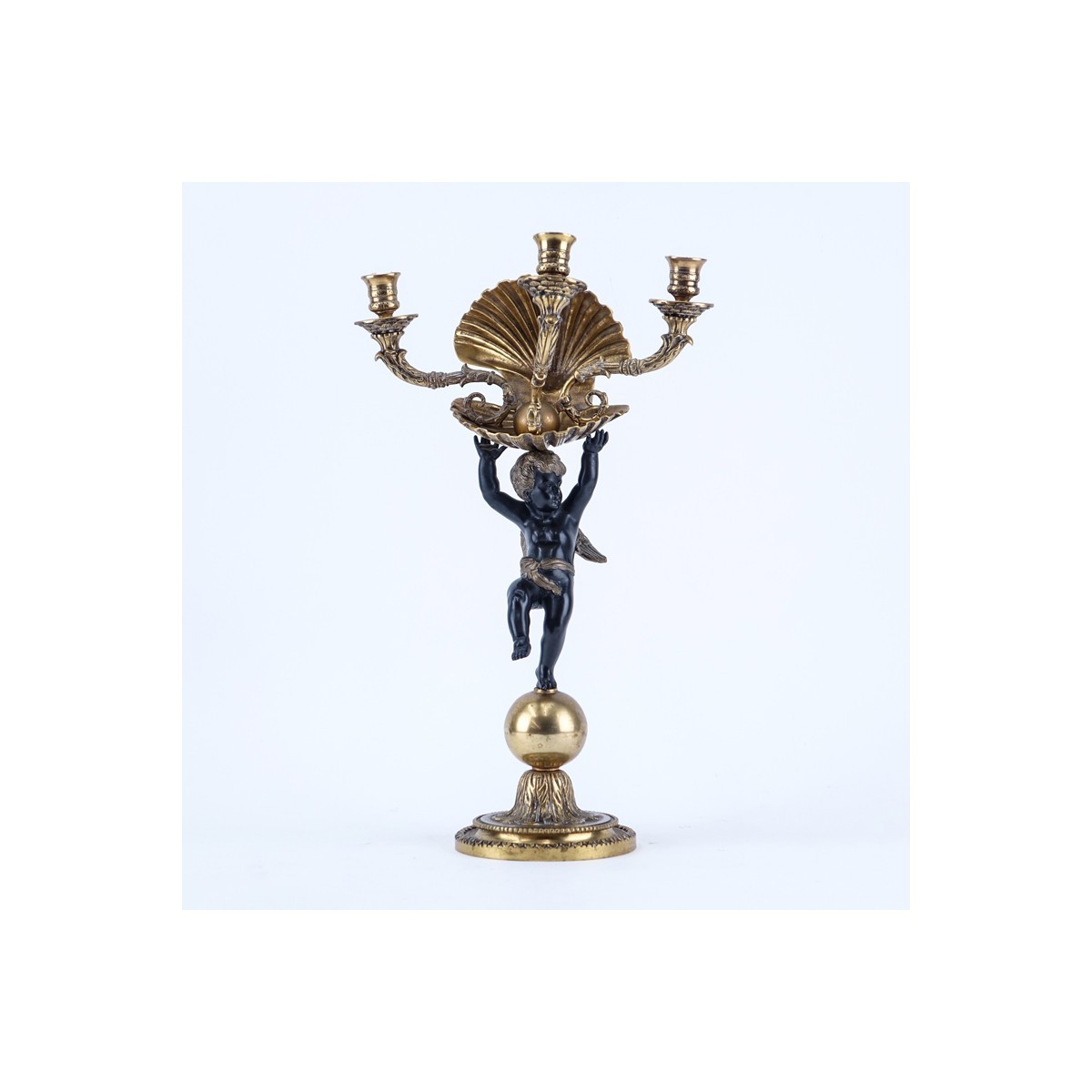 19/20th Century Empire Style Gilt Brass Three Arm Candelabrum with Cherub and Shell. Rubbing to gilt overall good condition.