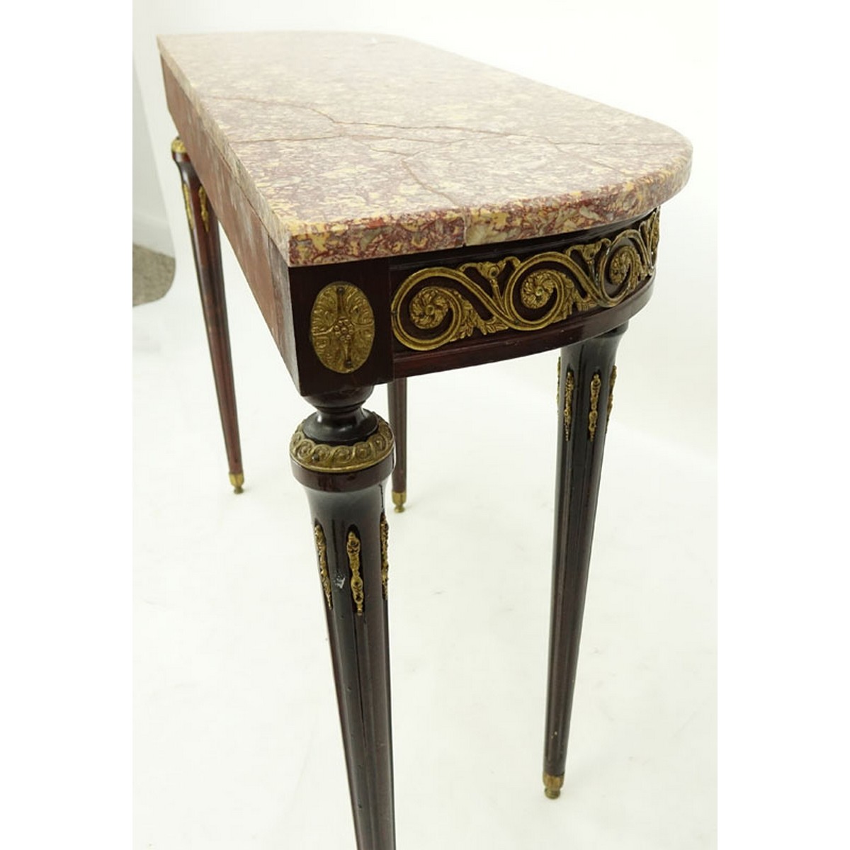 20th Century Louis XVI Style Gilt Bronze Mounted, Marble Top Console Table. Professional restoration to marble top, light scuffs to wood.