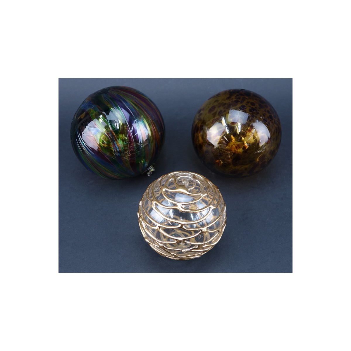 Group of Nine (9): Six Vintage Glass Paperweights along with Three Art Glass Spheres. Label attached to a few paperweights, spheres are unsigned.