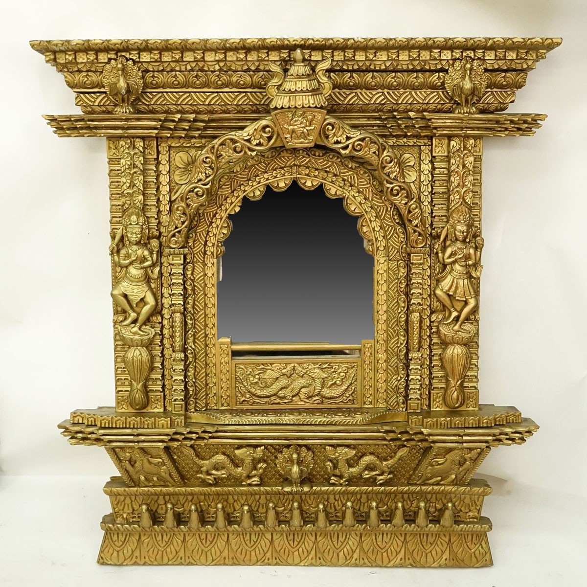 Large Impressive Antique Thai/Burmese Giltwood Carved High Relief Temple Mirror. Intricately carved with figures, birds, dragons, and scroll relief.