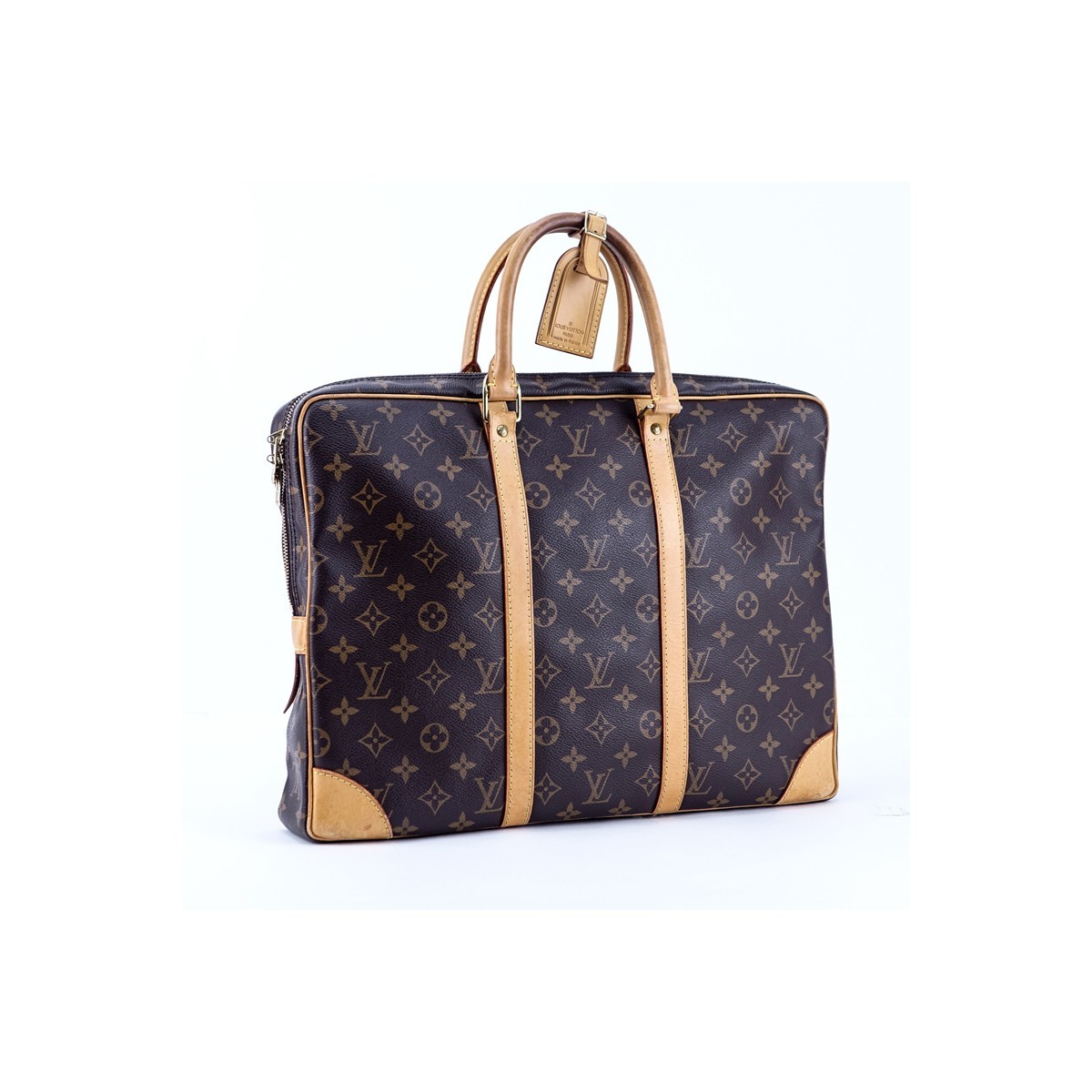 Louis Vuitton Brown Monogram Coated Canvas  Voyage Porte-Documents. Golden brass hardware, brown interior with zippered and various patch pockets.