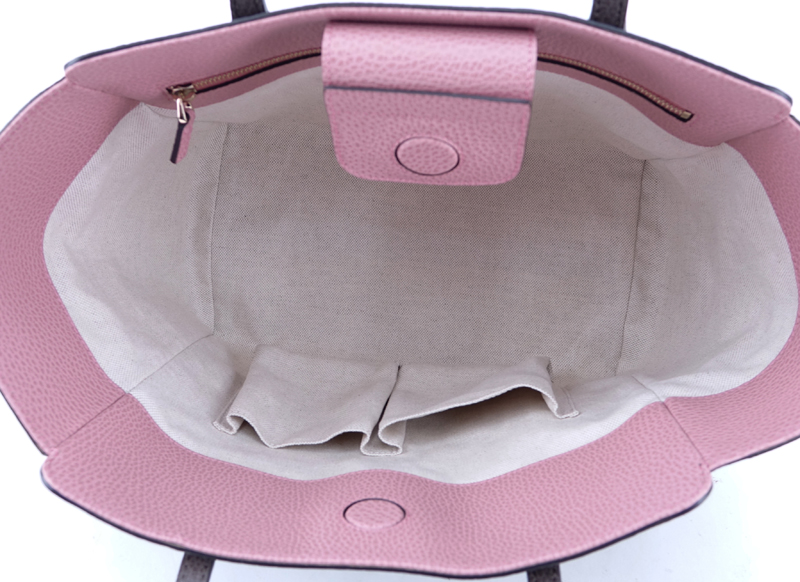 Gucci Taupe/Light Pink Grained Leather Swing PM Handbag. Gold tone hardware, interior of beige fabric with zippered and patch pockets.