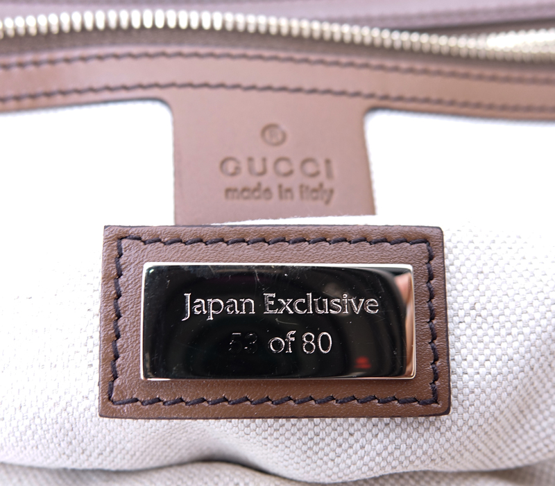 Gucci White/Brown Quilted Canvas And Leather Diamante Tote Japan Exclusive. Gold tone hardware, interior of beige canvas with zippered and patch pockets.