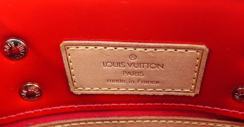 Louis Vuitton Flashy Red Monogram Vernis Reade PM Handbag. Golden brass hardware, red canvas interior with zippered pocket, vachetta handles.