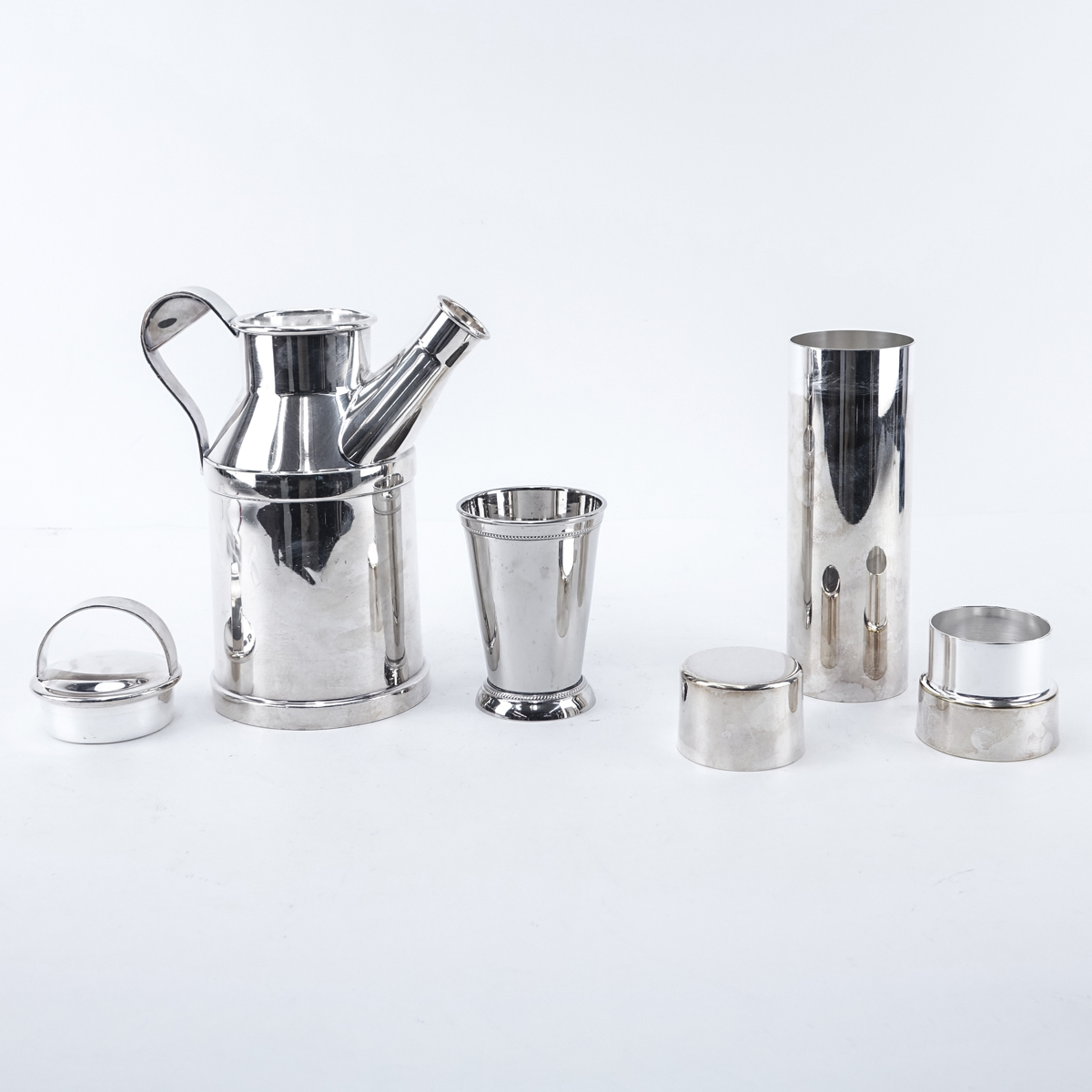 Grouping Of Silver Plate Bar Accessories. Includes: Reed & Barton shaker/decanter, Towle shaker, Towle tumbler, 6 golf club motif stirrers, 6 decanter labels.