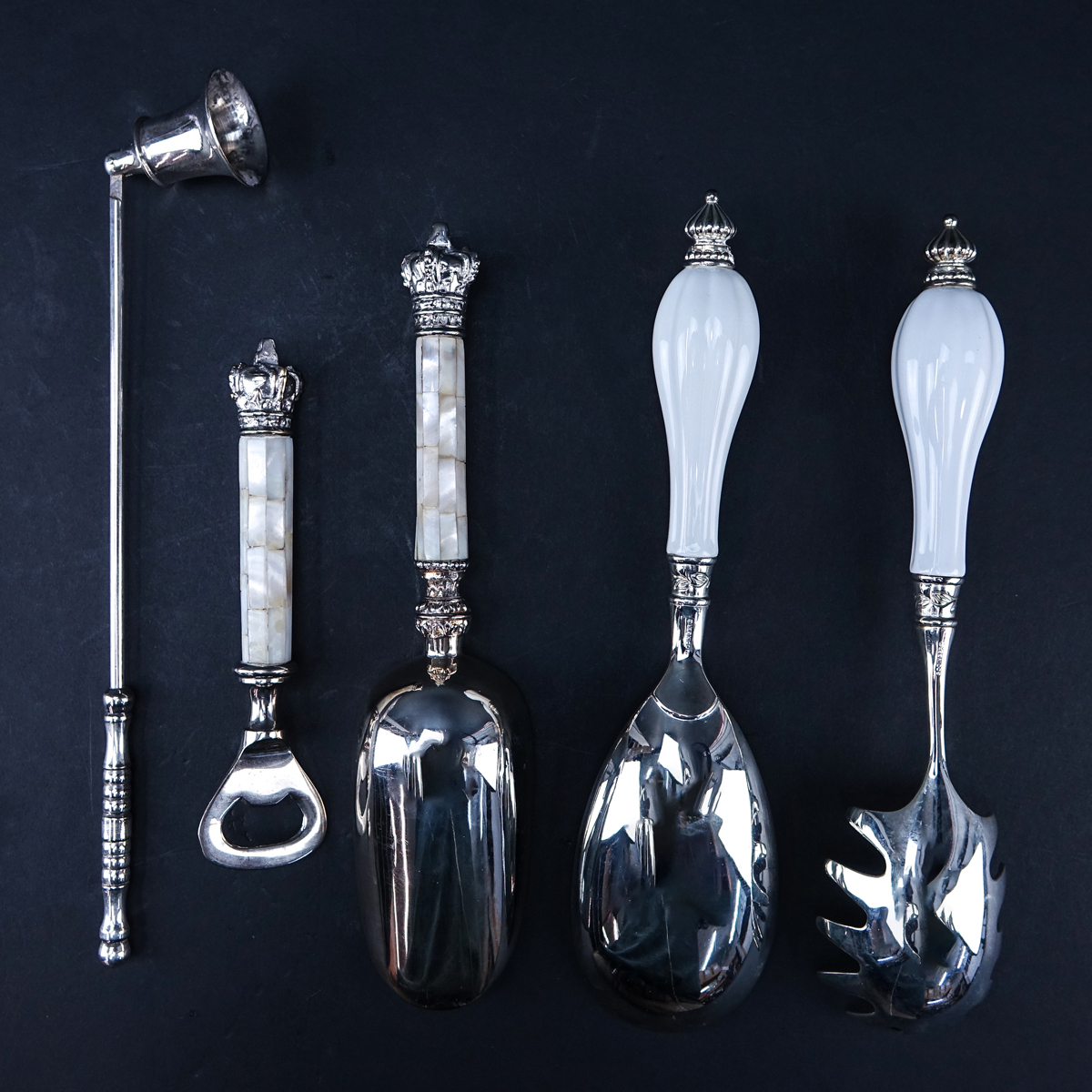 Collection of Five (5) Vintage Serving Pieces. Includes: Mother Of pearl Handled scoop and bottle opener, porcelain handled casserole spoon and past server, candle snuffer.