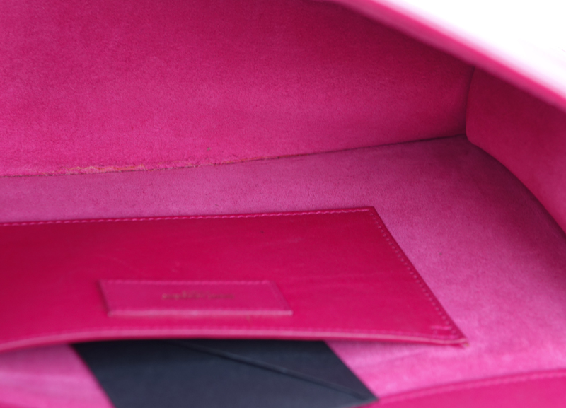 Saint Laurent Fuschia Leather Betty Handbag. Gold tone hardware and chain, suede interior with patch pocket.