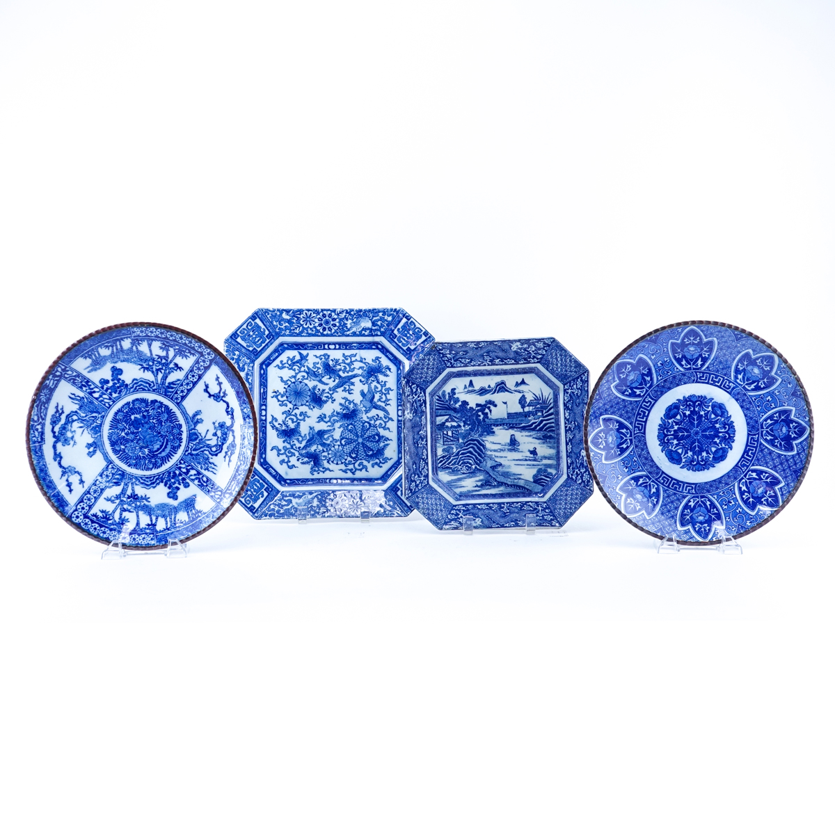 Four (4) Chinese Blue & White Pottery Chargers. Unsigned.