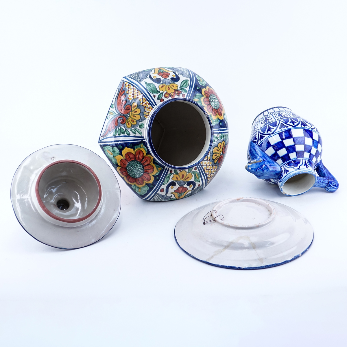 Grouping of Three (3): Large Mexican Faience Pottery Covered Jar, Faience Pottery Cabinet Plate, and Faience Pottery Pitcher. Covered jar is signed others are unsigned.