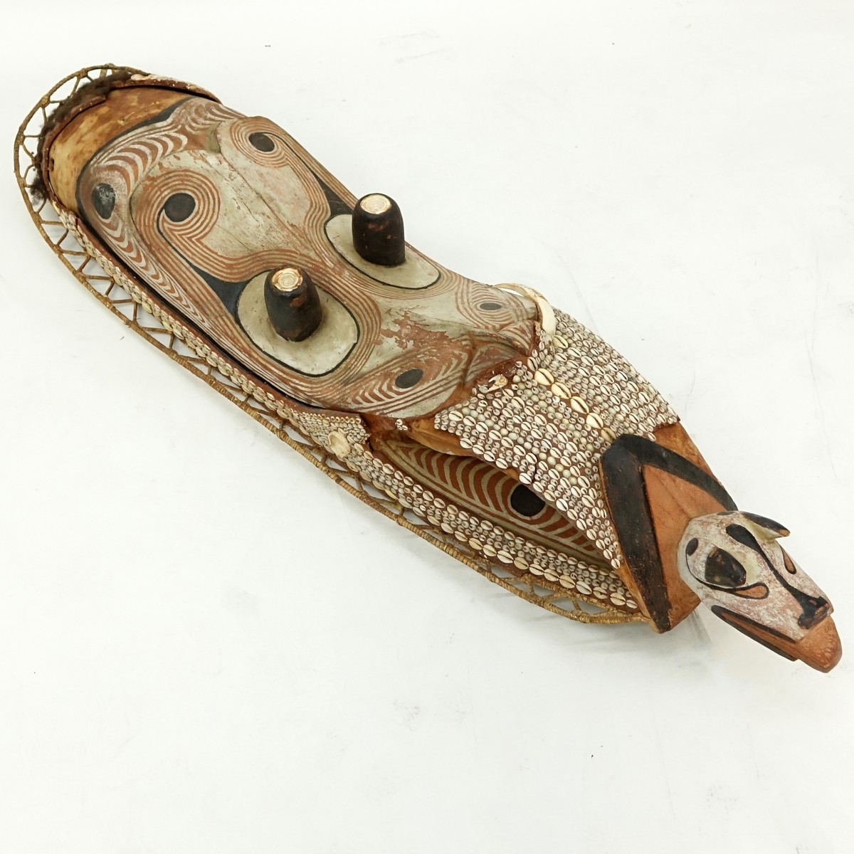 Large Wood Carved Polychrome Tribal Mask with Shell and Plaited Fibers. Possibly from the Sepik River, Papua New Guinea area.
