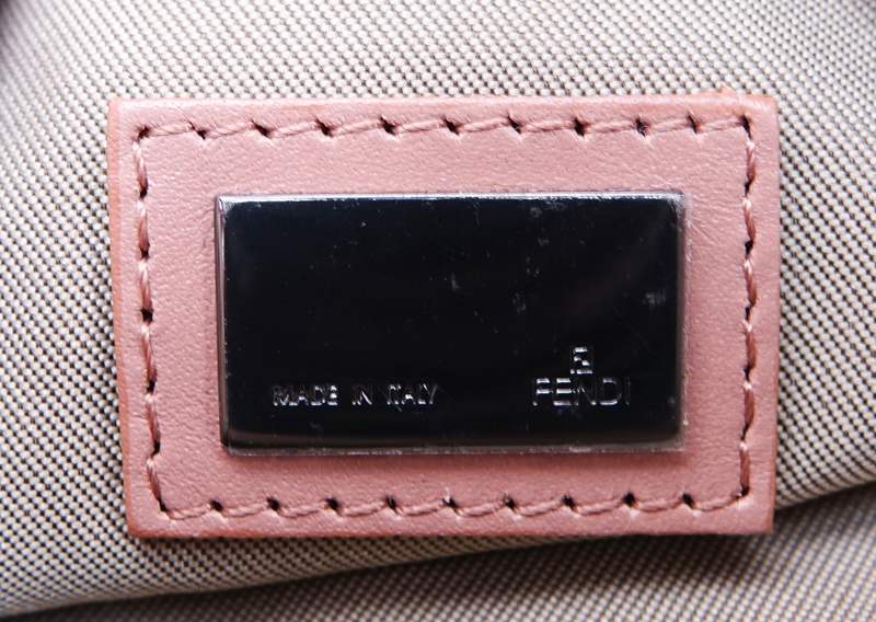Fendi Beige And Pink Monogram Canvas Baguette Mini Handbag. Antique pink leather straps and closure, Rhutenium hardware.