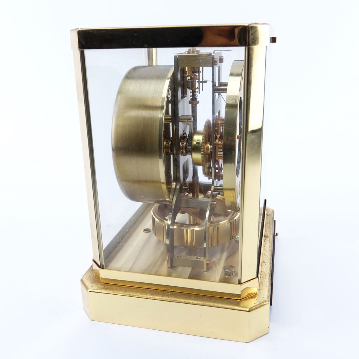 Jaeger LeCoultre Atmos Clock. Housed in brass and glass case.