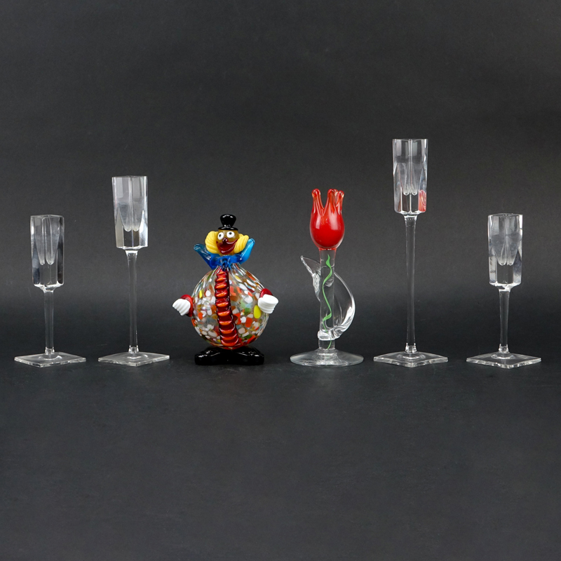 Collection of Six (6) Crystal and Art Glass Tableware. Includes: 4 Rosenthal tall crystal cordials, Murano art glass clown figurine, and Strombergshyttan art glass candleholder.
