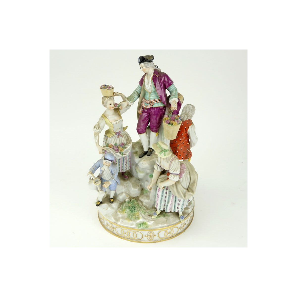 19th Century Meissen Hand Painted Porcelain Figural Group. Blue crossed sword mark to base.