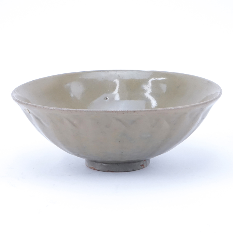 Chinese Song Dynasty or After Celadon Bowl. Impressed mark center bowl, lotus petals motif on outer surface.