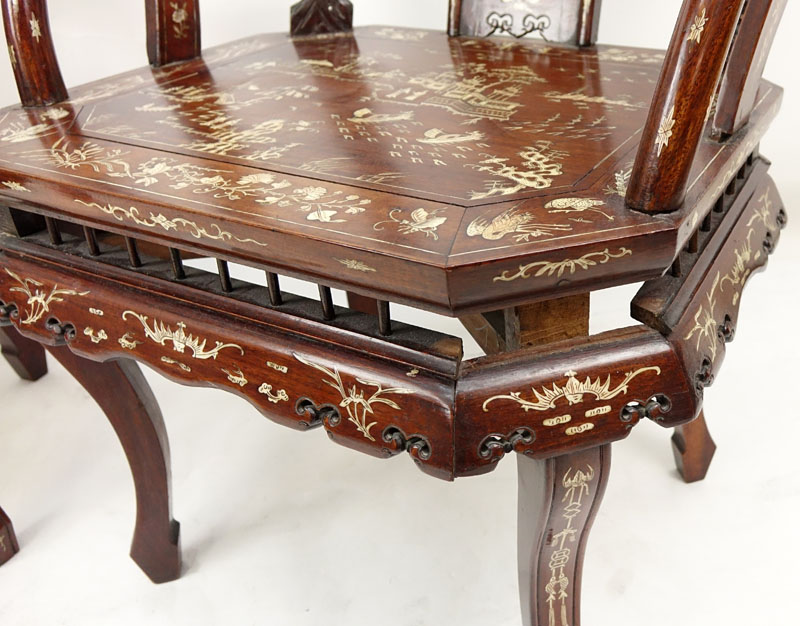Pair of Chinese Carved Hardwood and Bone Inlay Horseshoe Armchairs. One chair has splits to armrest and missing panel on lower gallery, rubbing to veneer on both or else good condition.