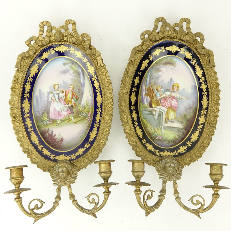 Pair French Sevres Style Gilt Bronze And Hand painted Porcelain Two Light Sconces. Unsigned.
