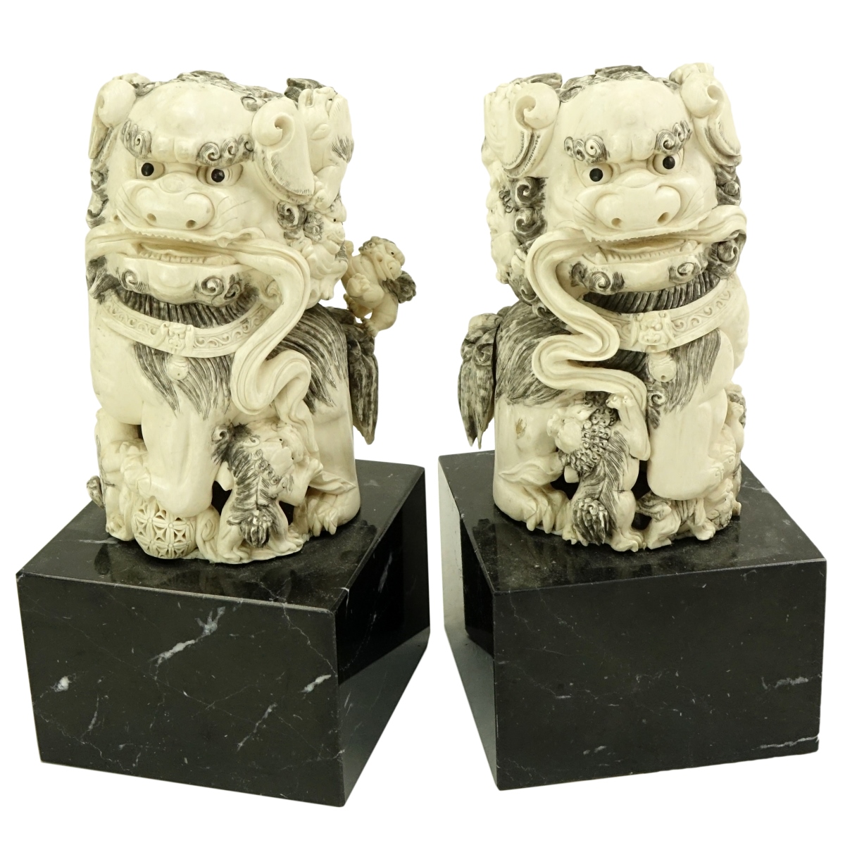 Pair of Chinese Carved Ivory Foo Dogs Figures