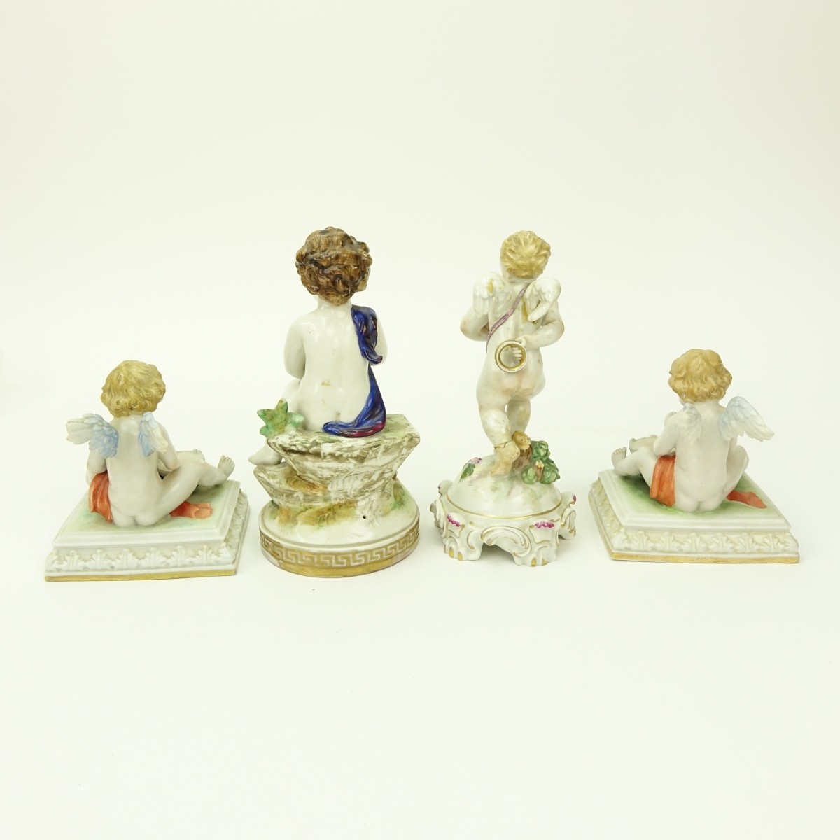 Grouping of Four (4) Antique Porcelain Figurines