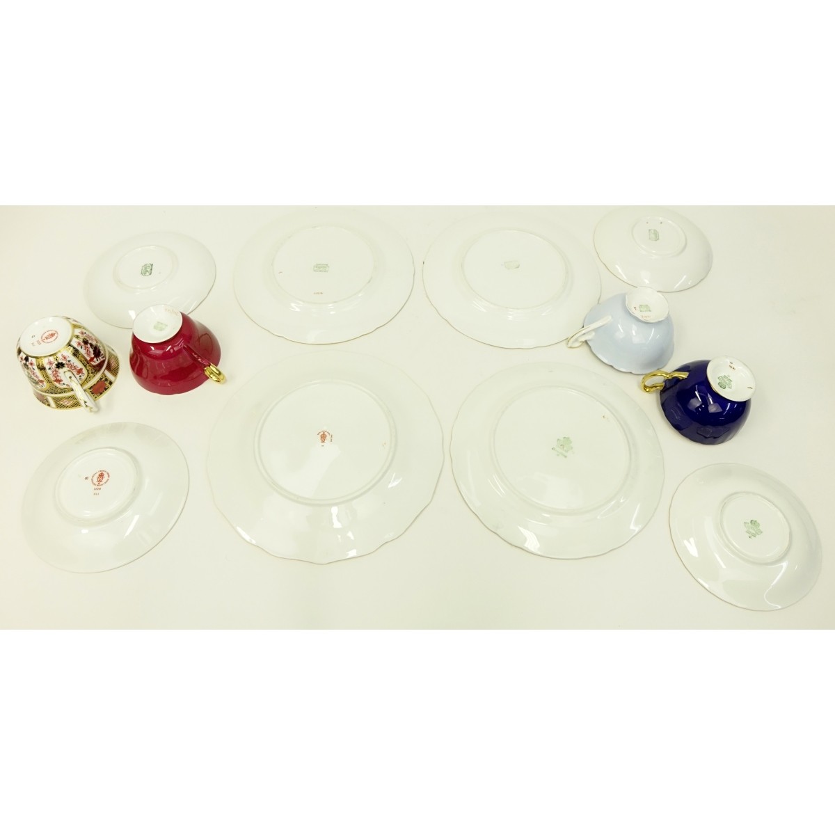 Four English Porcelain 3 Piece Cup And Saucer Sets