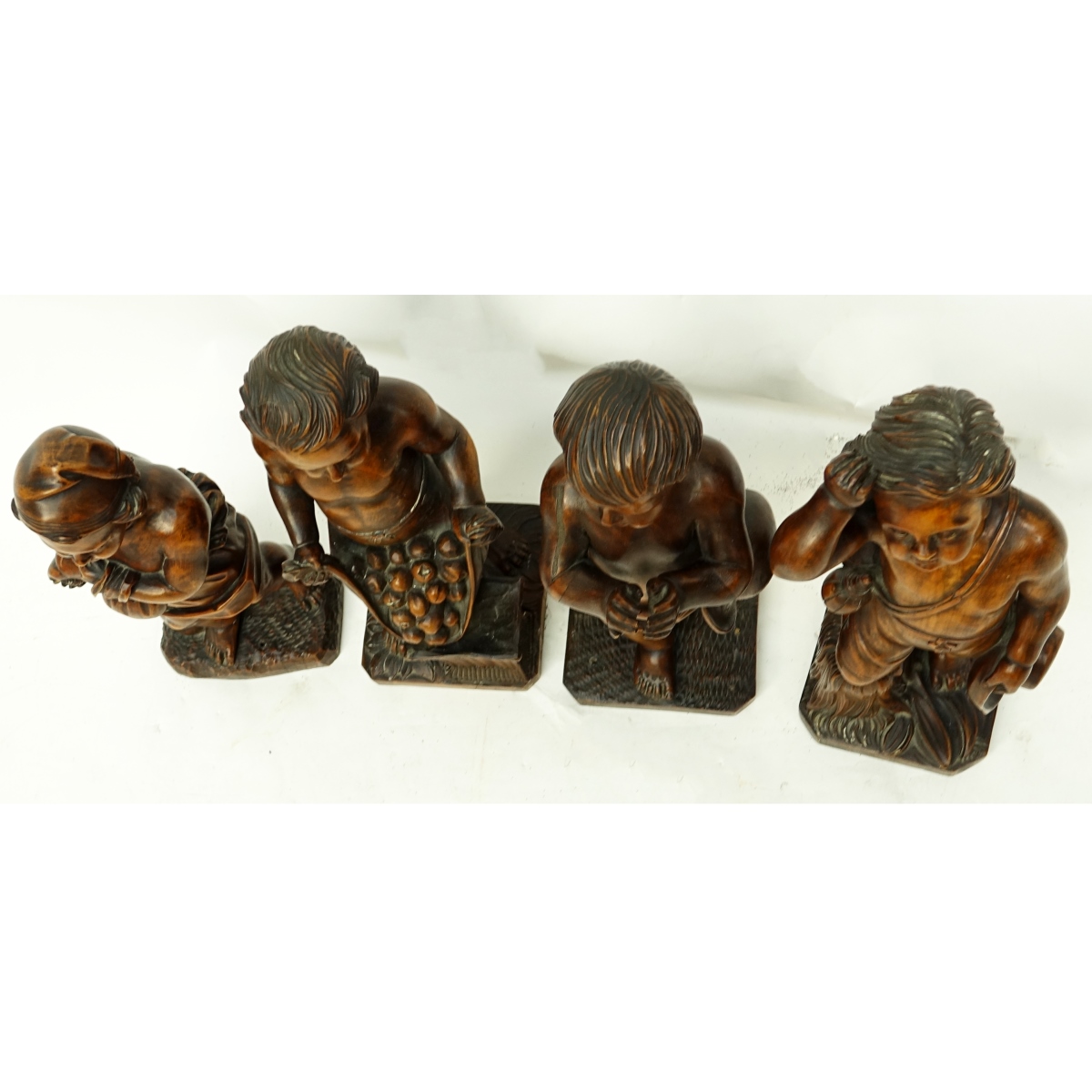 Four (4) Wood Carvings