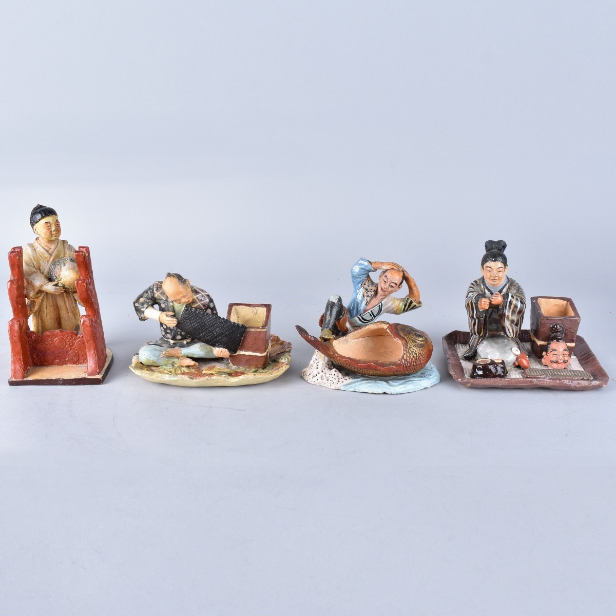 Four Japanese Pottery Figures