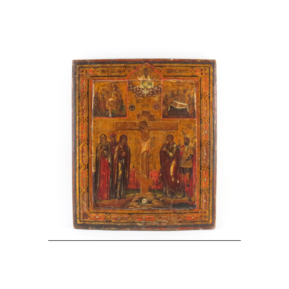 18th Century Russian Painted and Parcel Gilt Icon on Panel Depicting the Crucifixion of Christ. War