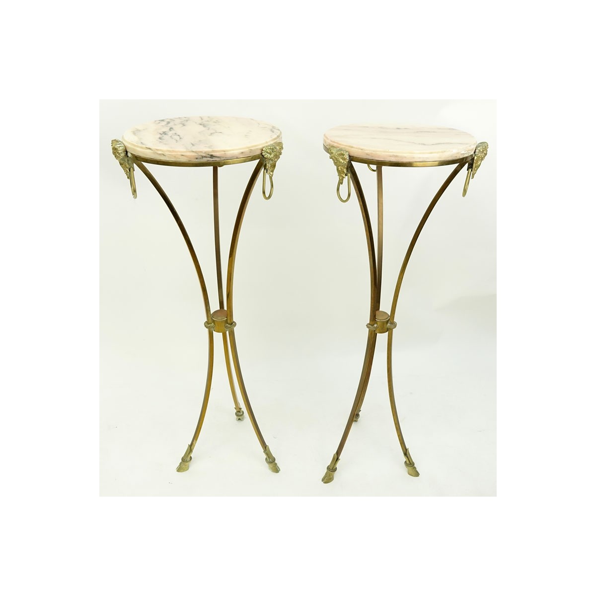 Pair of Marble Top Maison Jansen Style Brass Pedestal Tables. Rams head fittings standing on hoof f