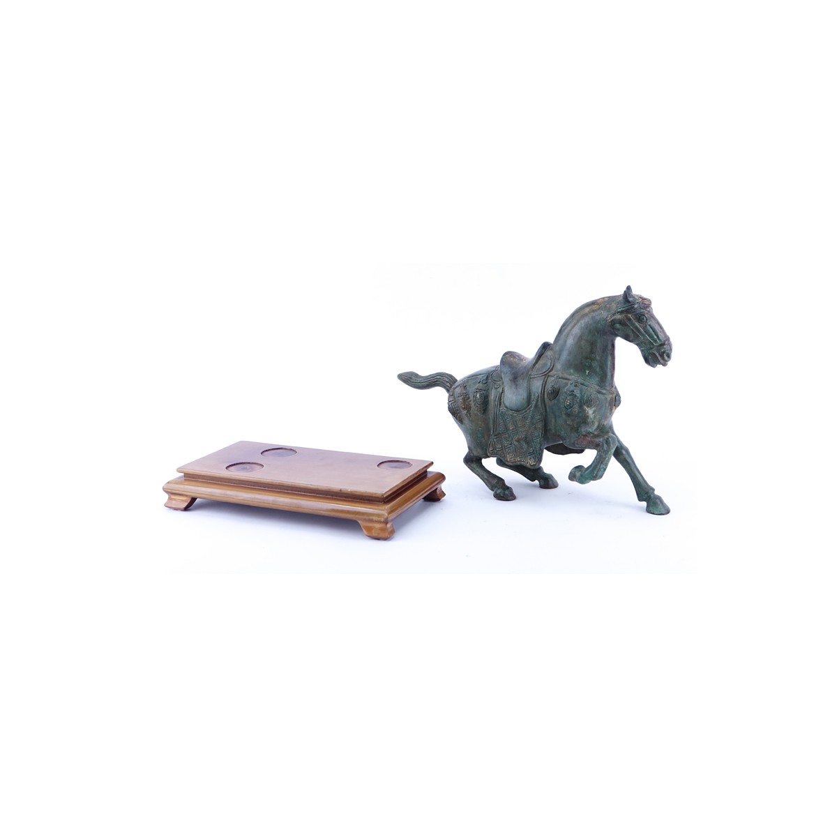 Chinese Tang Dynasty Style Patinated Bronze Model of a Horse on Wooden Stand. Rubbing to surface, s