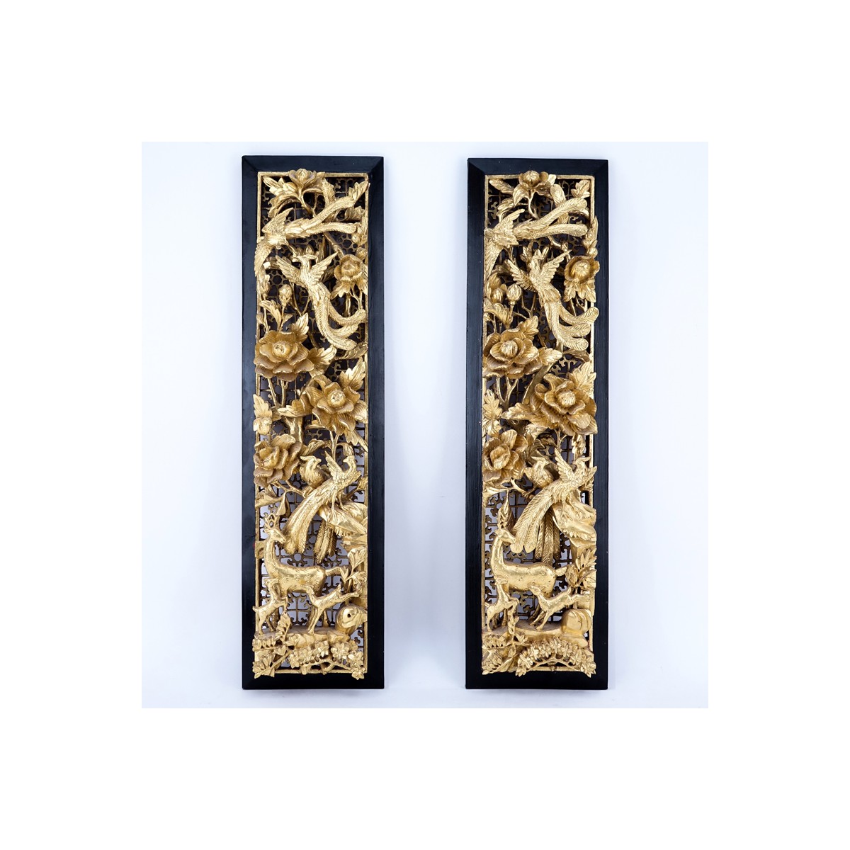 Pair of Chinese Giltwood Deep Relief Carved Panels. A few small nicks to relief on one panel, light