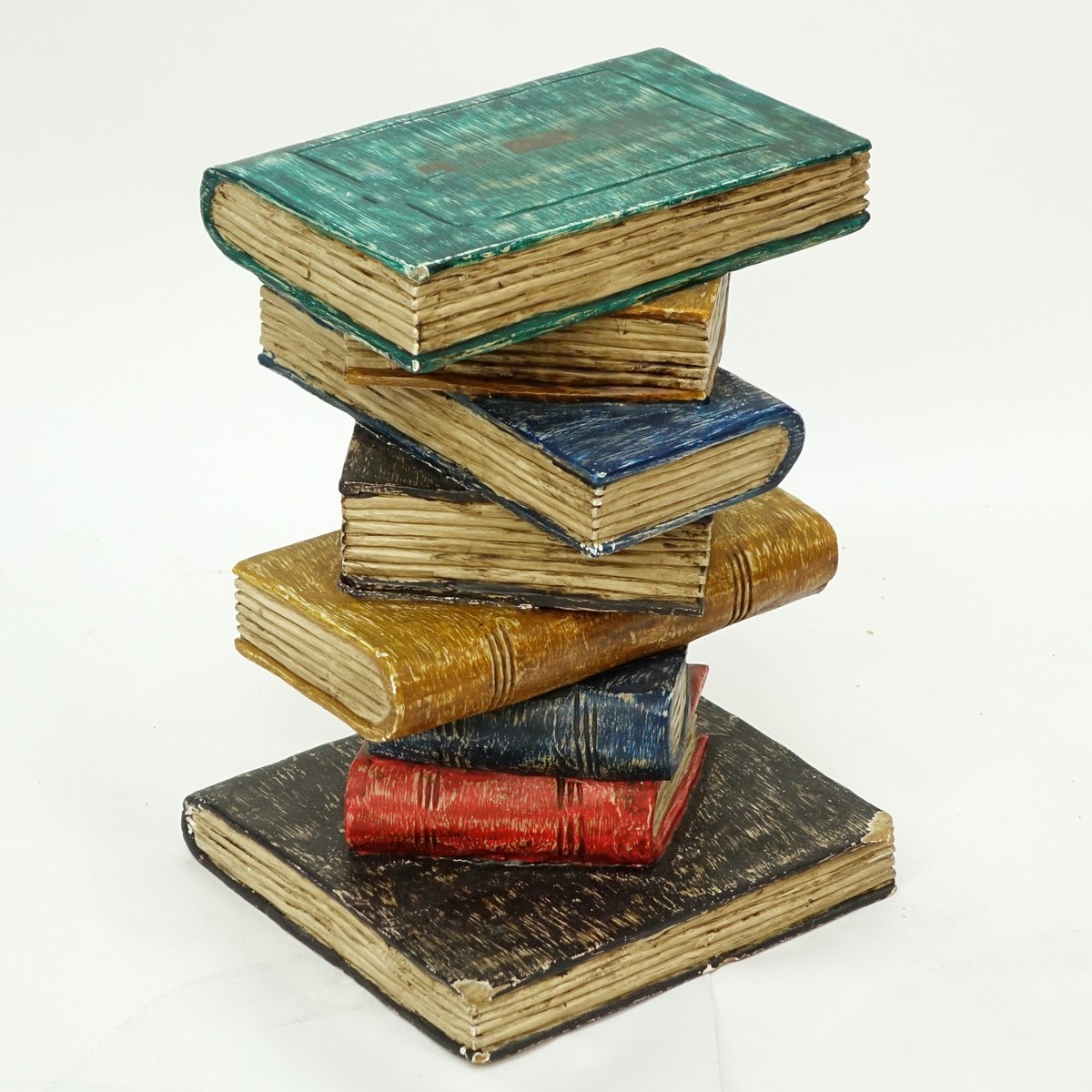 Hand Carved and Painted End Table in the form of Stacked Books. Wear to the corners at the base, ru