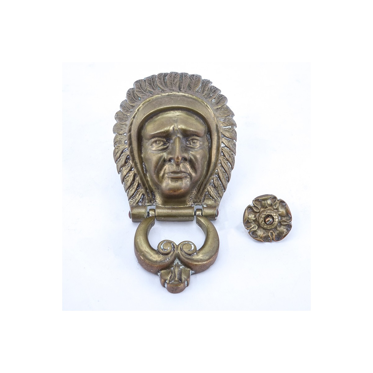 Antique American Indian Brass Door Knocker With Strike Plate. Marked REG NO 927861. Good condition.