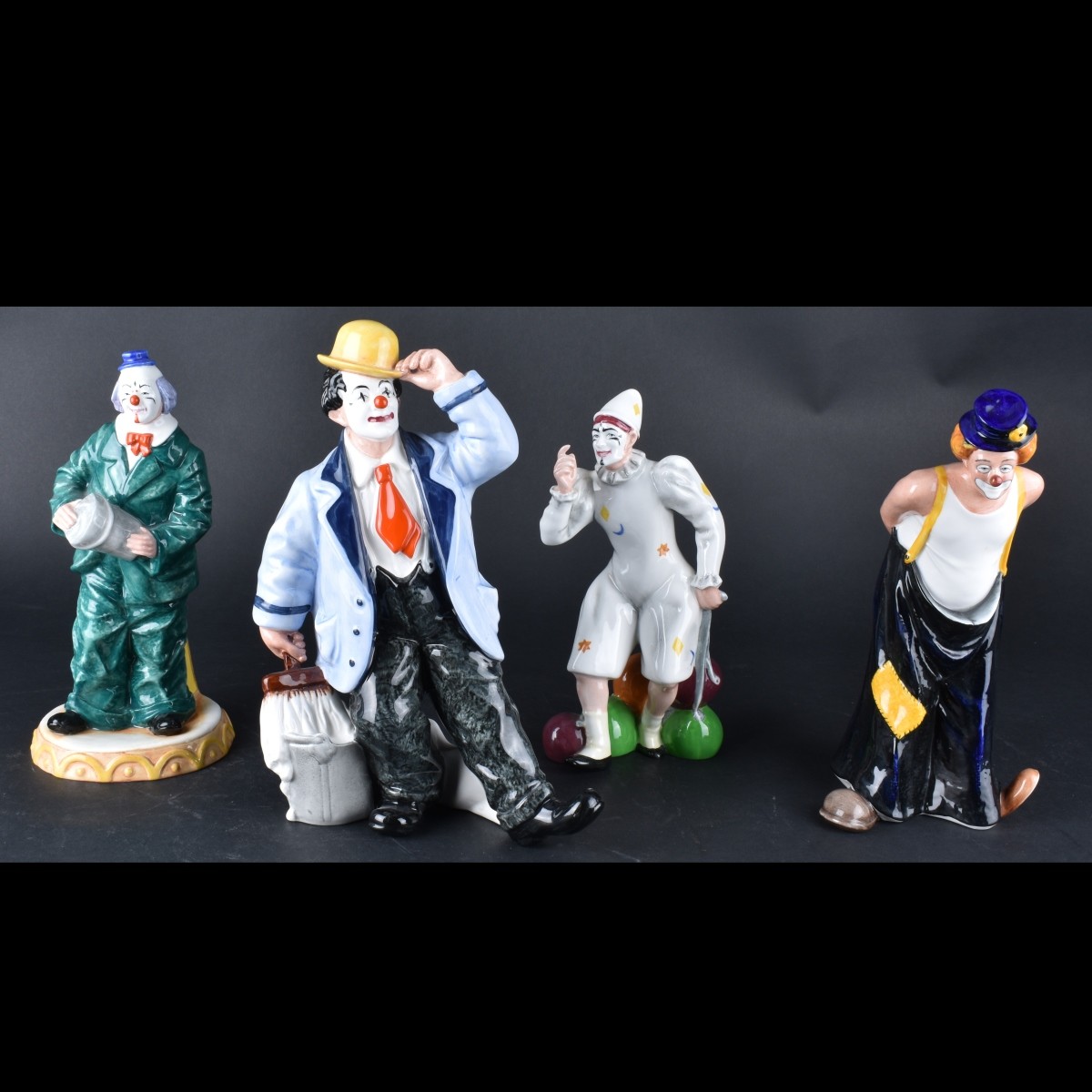 Four Royal Doulton Figurines