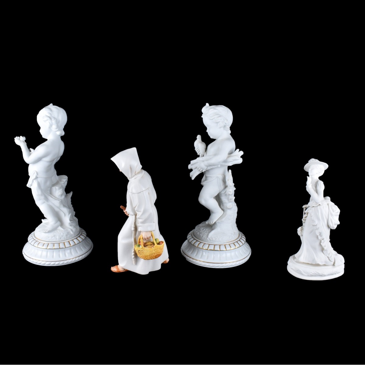 Four Bisque Figurines Kodner Auctions