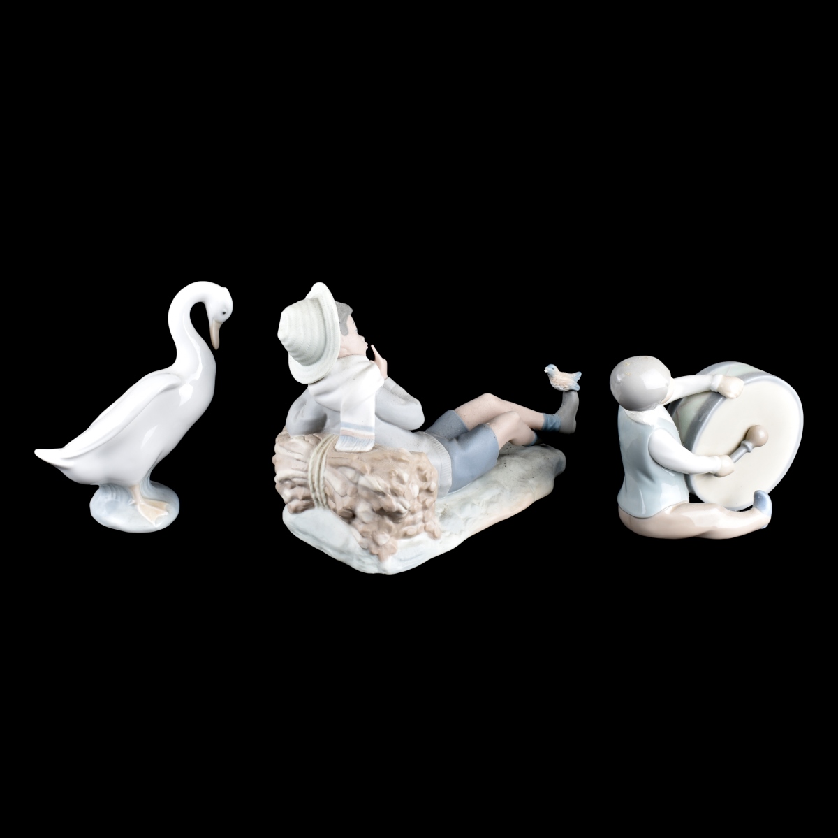 Three (3) Lladro and Nau Porcelain Figurines