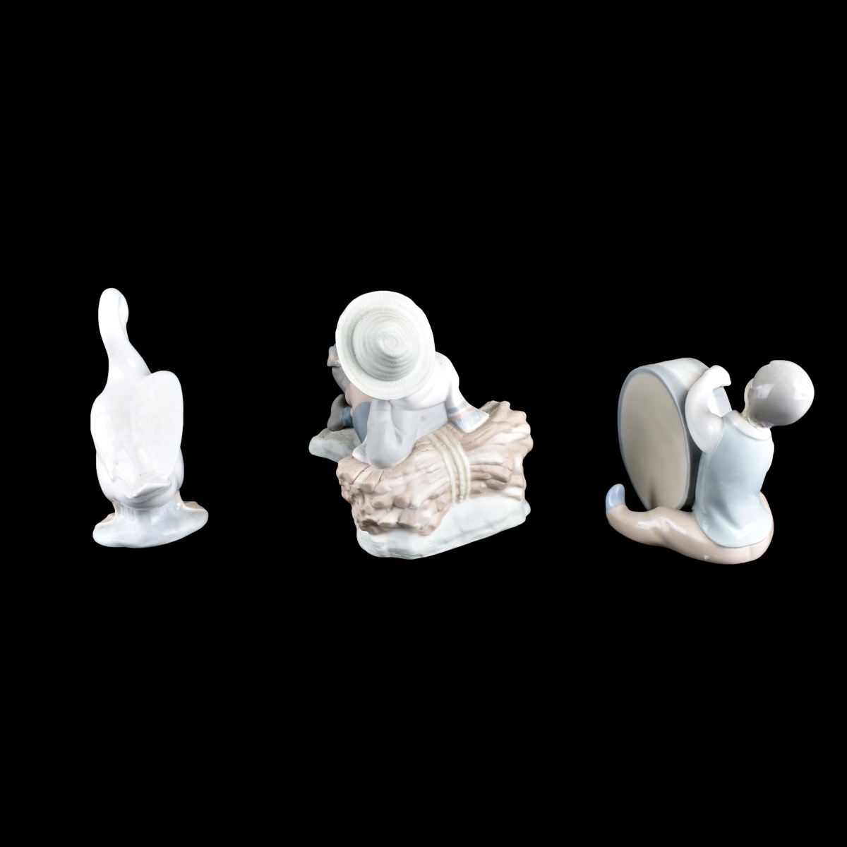 Three (3) Lladro and Nau Porcelain Figurines