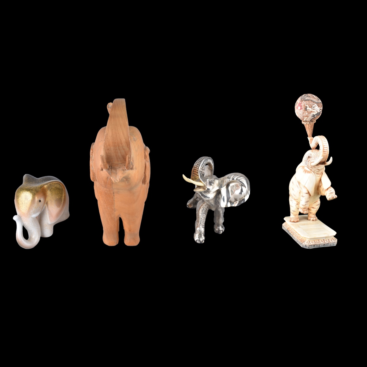 Four Elephant Figurines