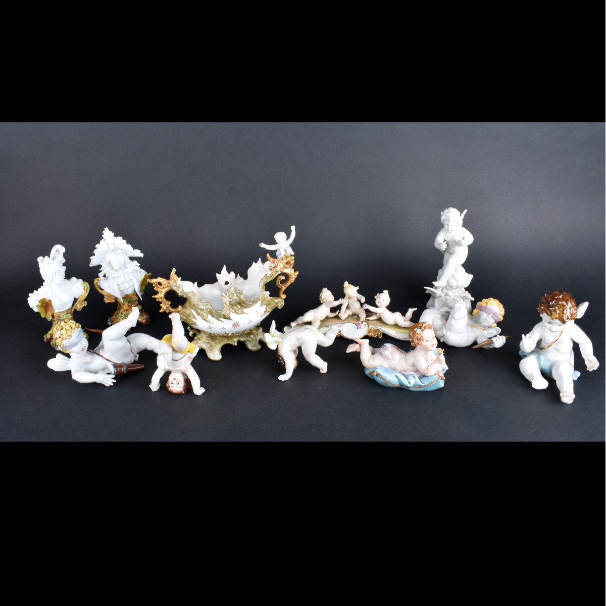 Eleven Porcelain/Bisque Figurines