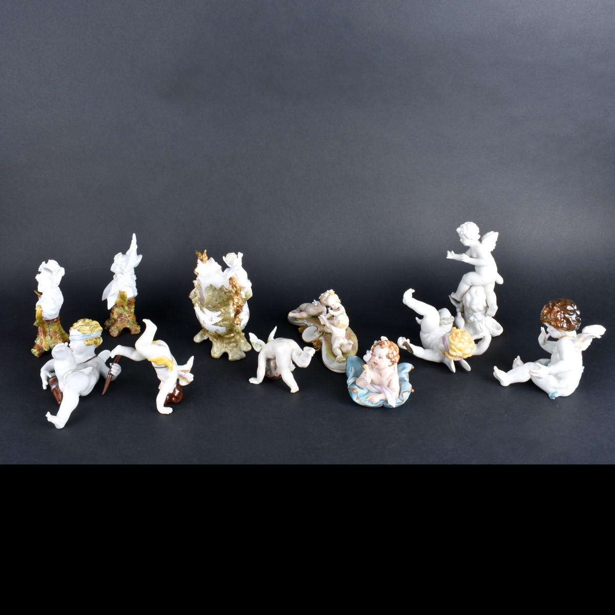 Eleven Porcelain/Bisque Figurines