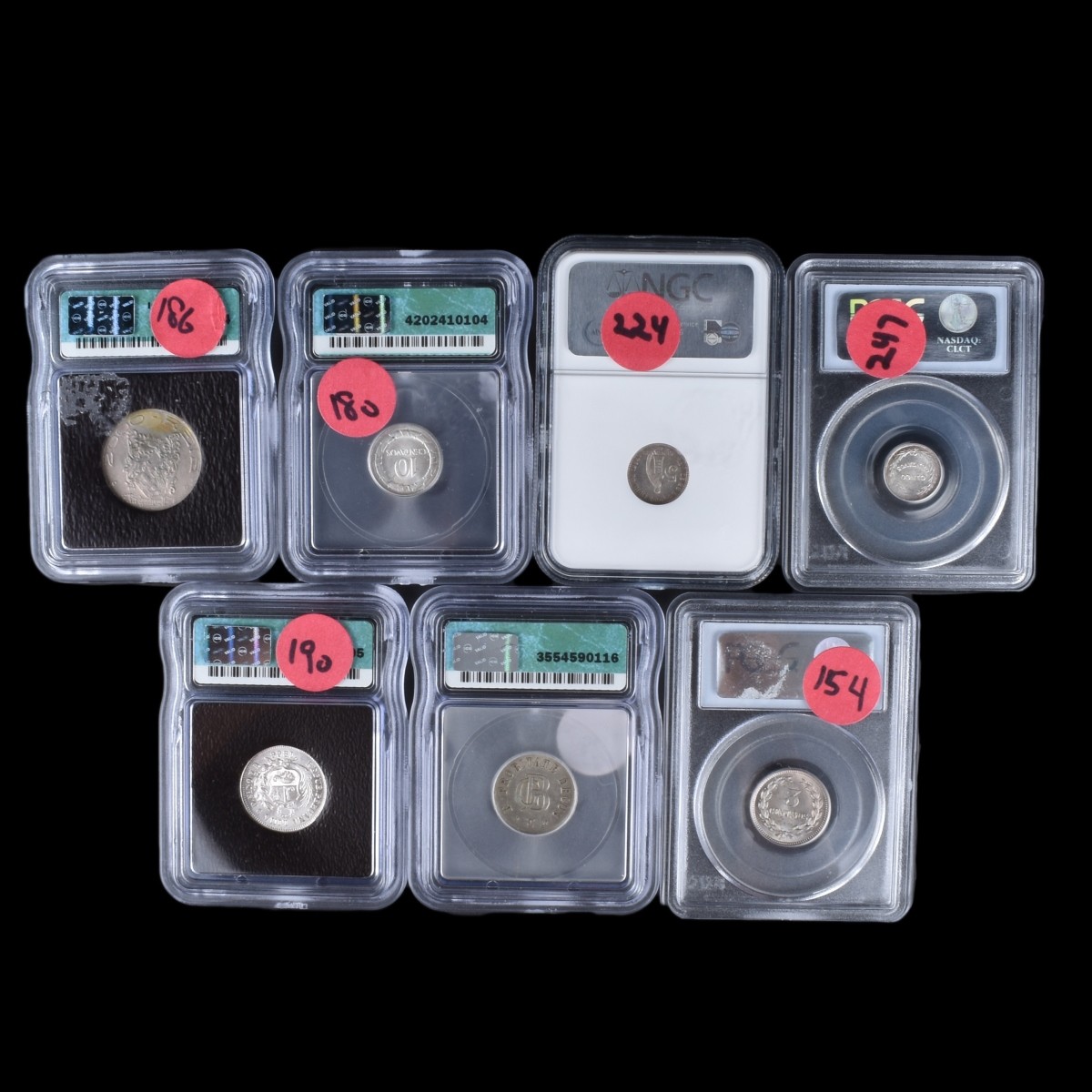 Seven (7) Assorted Silver Coins