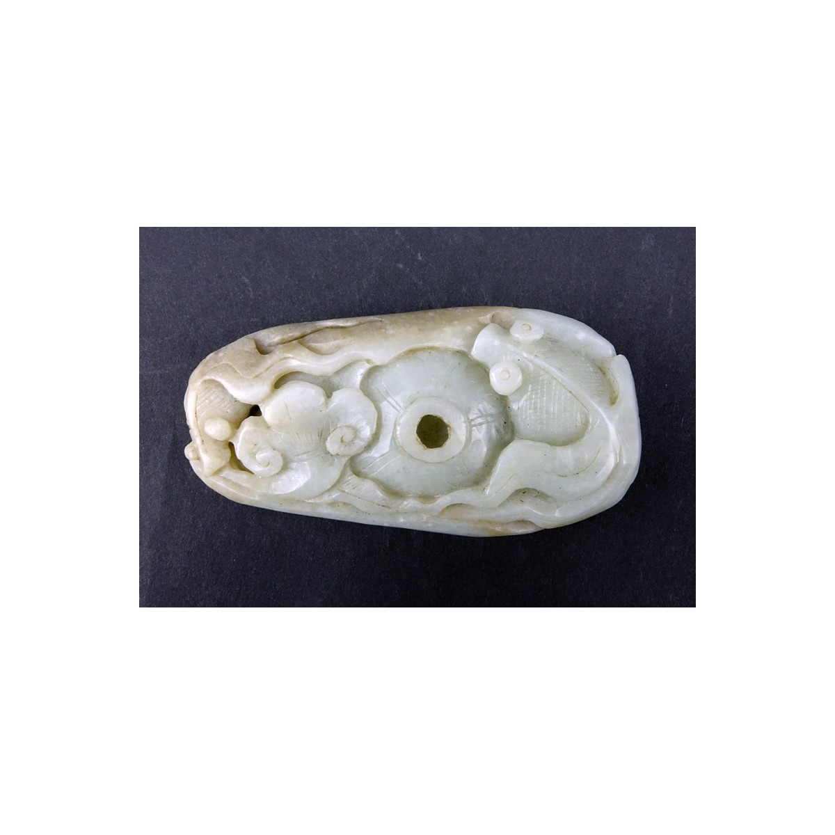 19/20th Century Chinese Carved Jade Pendant. Natural wear. Measures 4" H x 