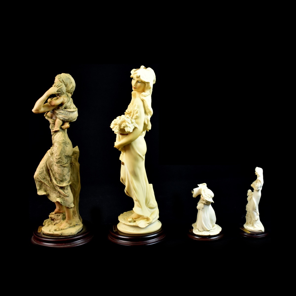 Four Giuseppe Armani Figurines