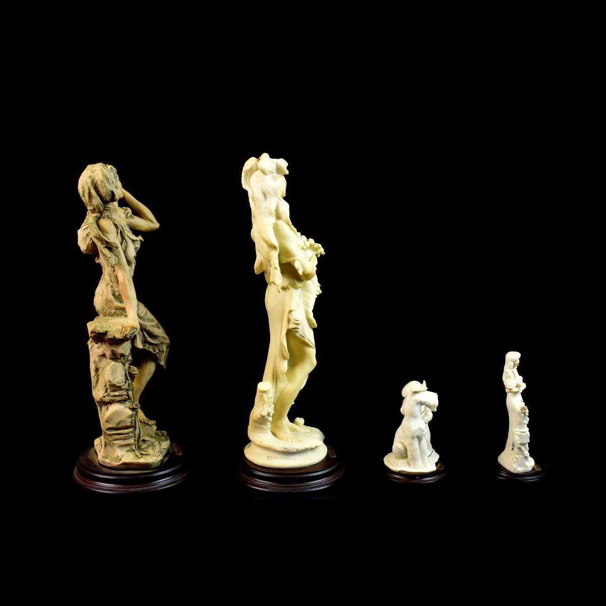Four Giuseppe Armani Figurines