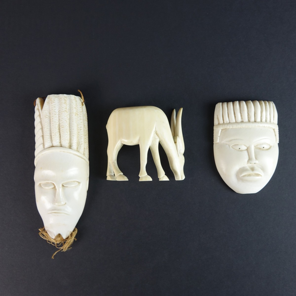 Three (3) African Carved Figurines
