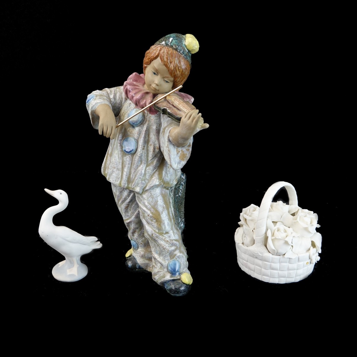 Three (3) Porcelain Figurines