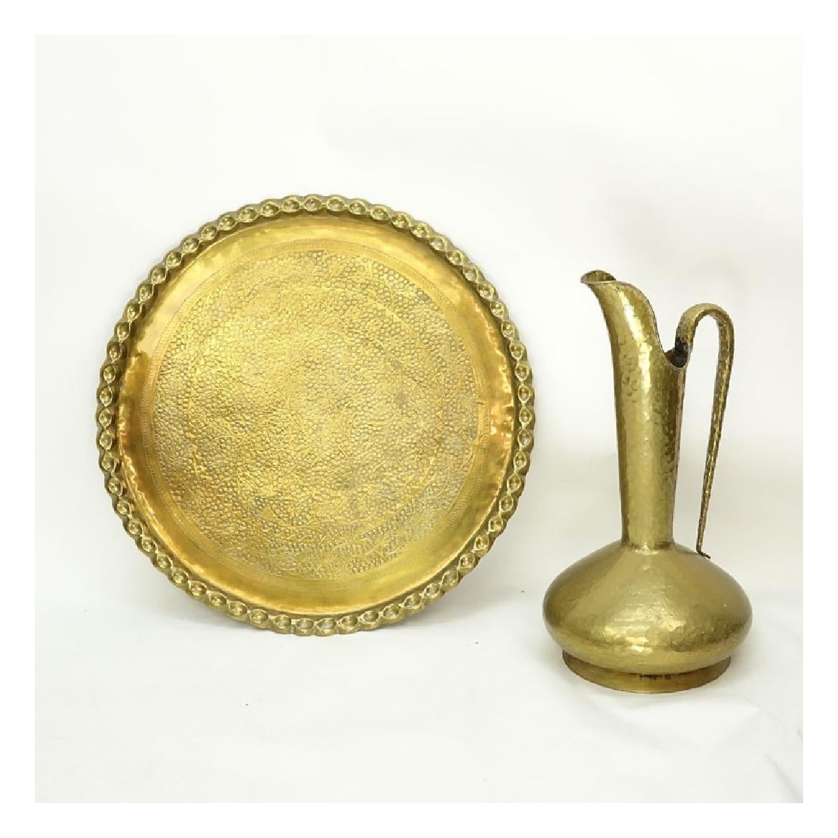 Grouping of a Large Brass Charger and Ewer