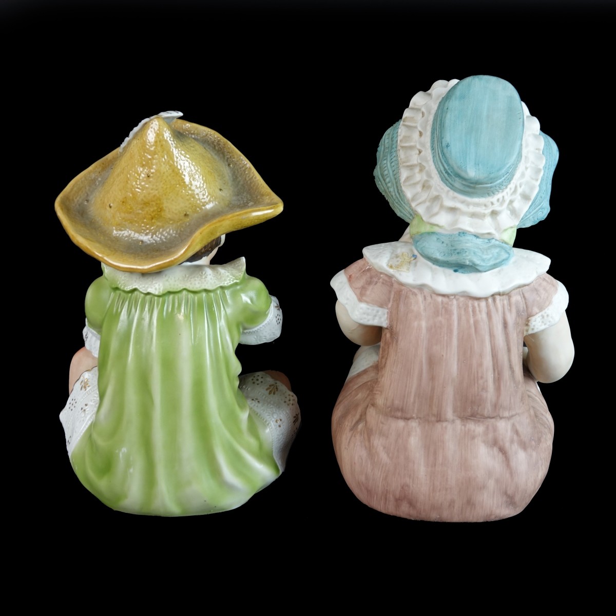 Two (2) Bisque Porcelain Seated Babies