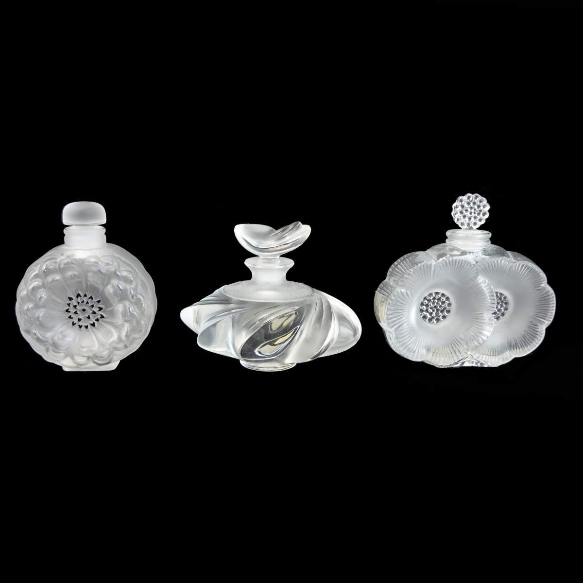 Three Lalique Crystal Perfume Bottles